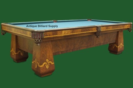 Brunswick Pool Table- Walnut / Mahogany: NOTE: This pool table is being sold from an off-site location in Rockford, IL. Please call 815.923.7000 to make an appointment for viewing. Unusual and rare Brunswick antique pool table manufactured i