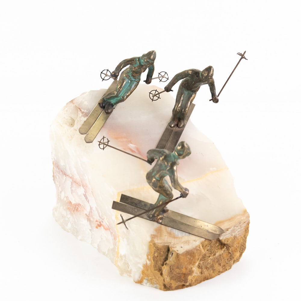 Large Quartz Rock with Skiers: One of the skier's poles snapped off but is taped to item. Can be easily repaired. NOTE: Pick up recommended due to fragility of this item. Please discuss with Shipping Department.