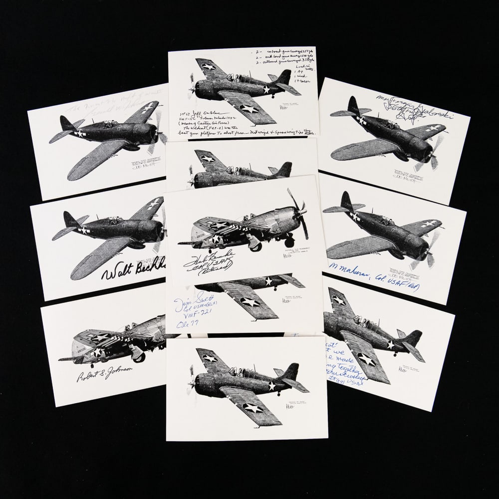 P-47 & F4F Ace and MOH Signed 11-Card Lot: Exceptional collection of eleven black-and-white art postcards featuring two iconic WWII fighters: the Republic P-47 Thunderbolt and the Grumman F4F Wildcat. Ten of the cards have been signed by