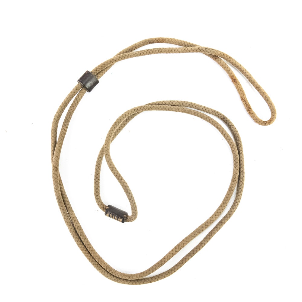 RARE Japanese Nambu Type 14 Pistol Lanyard: Here is a RARE, Japanese Nambu Type 14 Pistol Lanyard in very good condition. The lanyard shows staining and wear from field use and age. The two leather loops are supple, and the stitching is