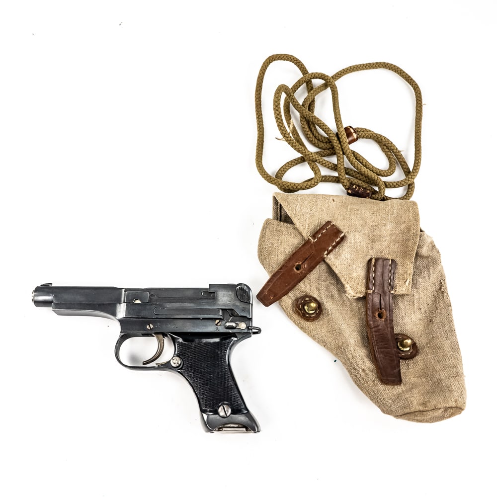 Japanese Type 94 8mm Nambu Pistol (c) 18010: WW2 Japanese Type 94 pistol made by Nagoya in August of 1941. Very nice gun with one matching mag and a flare gun holster and lanyard . Condition is 98% and is near factory mint. Perfect grips and bor