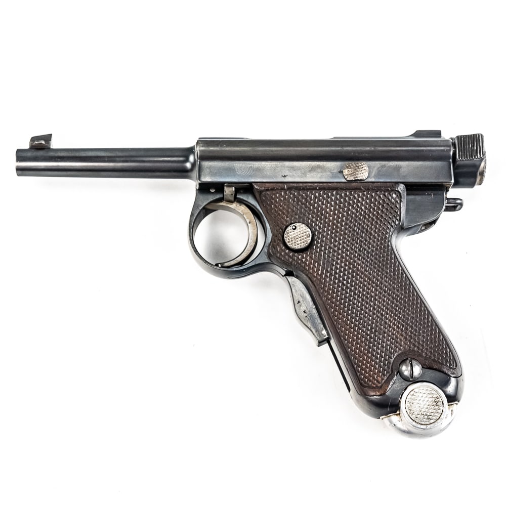 Pre WWII Baby NAMBU 7mm Pistol (c) 3164: Pre World War II Japanese Small Nambu "Baby Nambu" made by Koishikawa Arsenal (Tokyo) prior to 1927. 7MM Nambu. The serial number of this outstanding specimen places it in the middle of the production