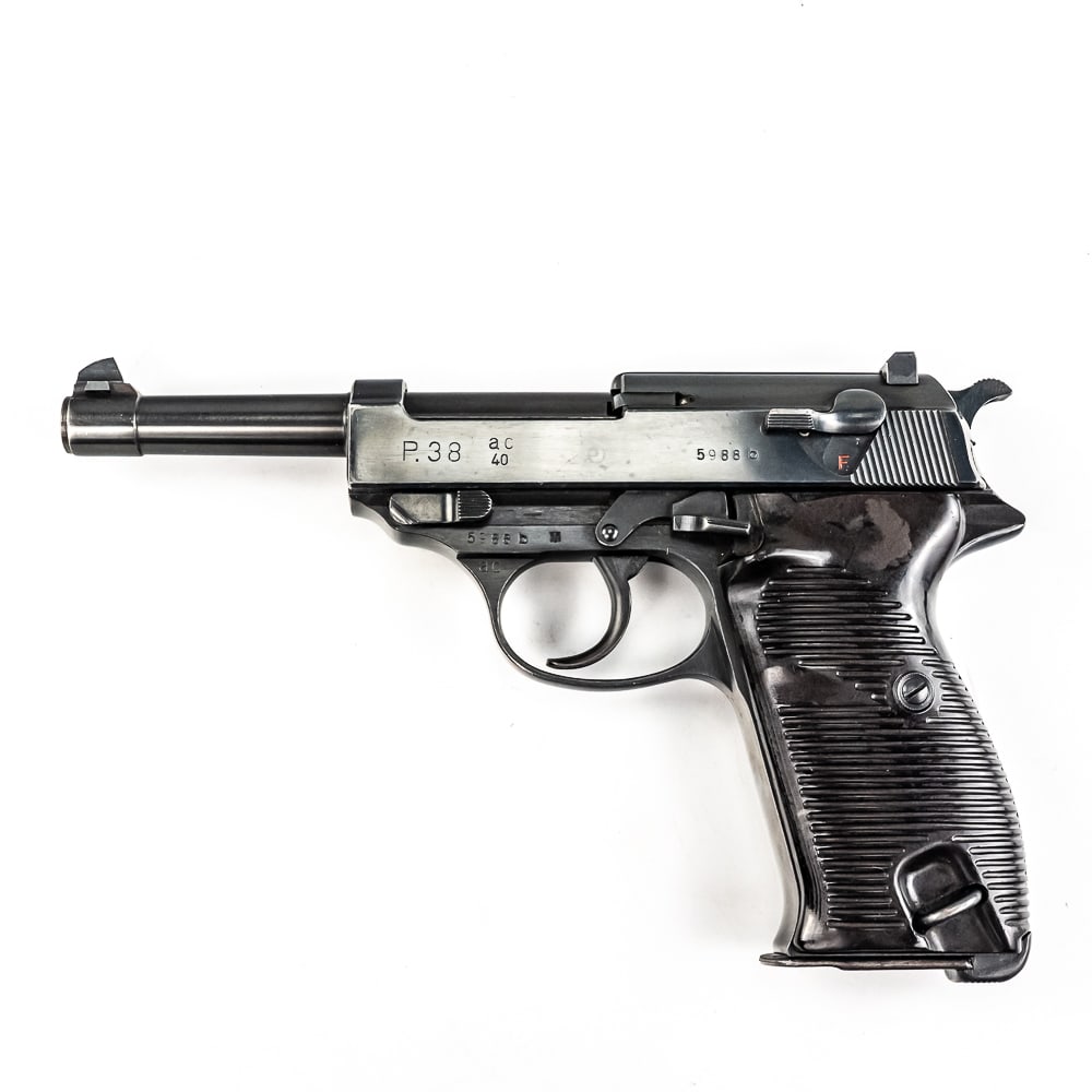 Early Walther Produced P-38 AC40 Pistol (5988b)(C): Early production (November 1940) German P-38 AC40 "b" block pistol. This pistol has all matching numbers (5988b), a numbered magazine (5469b), and matching grips. It retains 99% of its original, high