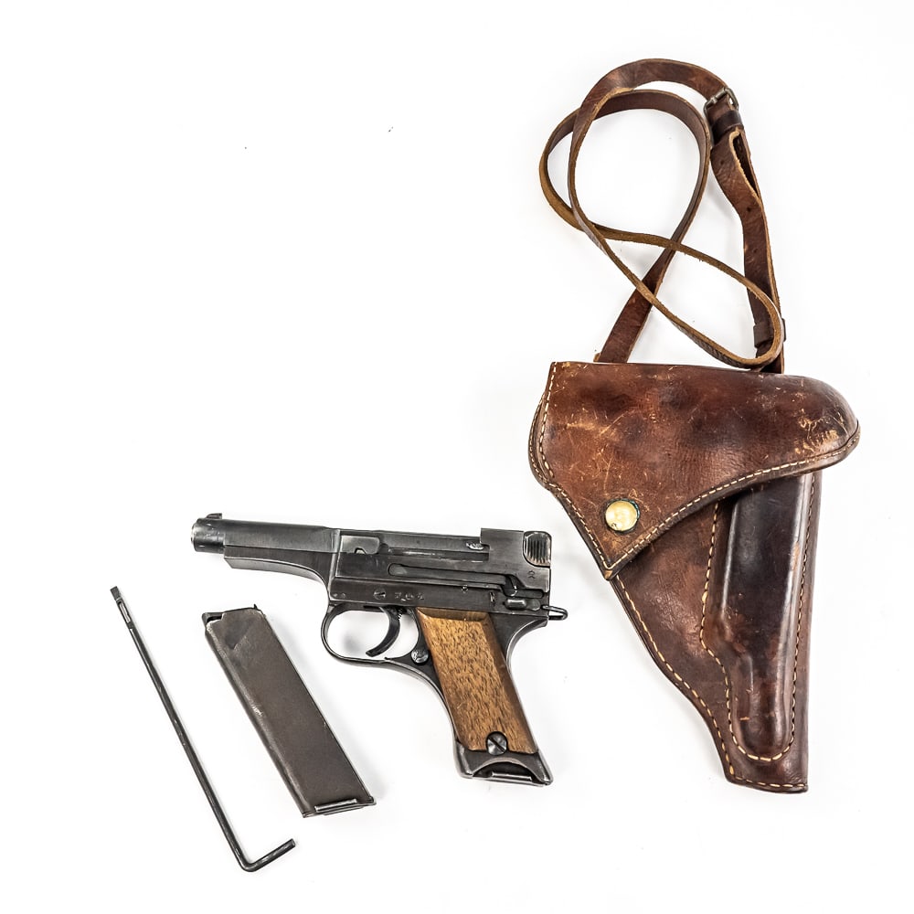 WWII Japanese Type 94 (66733) (C): World War II Japanese Type 94 pistol made by Nagoya in January of 1945. Very nice gun with one matching and one non-matching magazine with holster and cleaning tool. Condition is 98% and is near facto