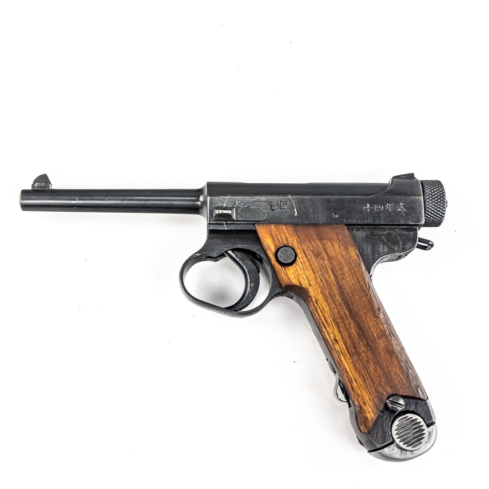 MINT Late War Japanese Type 14 Pistol 71804 (C): Late World War II Japanese Type 14 pistol made by Nagoya in June of 1945. Very late war, "last ditch" gun with rough tooling and mill marks. Condition is 99% and is near factory mint. Perfect late war