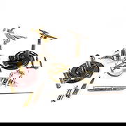 WWII Era "Wounded"Trench Art Lot: Assorted lot of WWII era trench art that is missing pieces or damaged in some fashion. 3 P-38 styled airplanes in varying states of repair(1 with plastic DAKAWARE base, 1 fantasy twin engine airplane