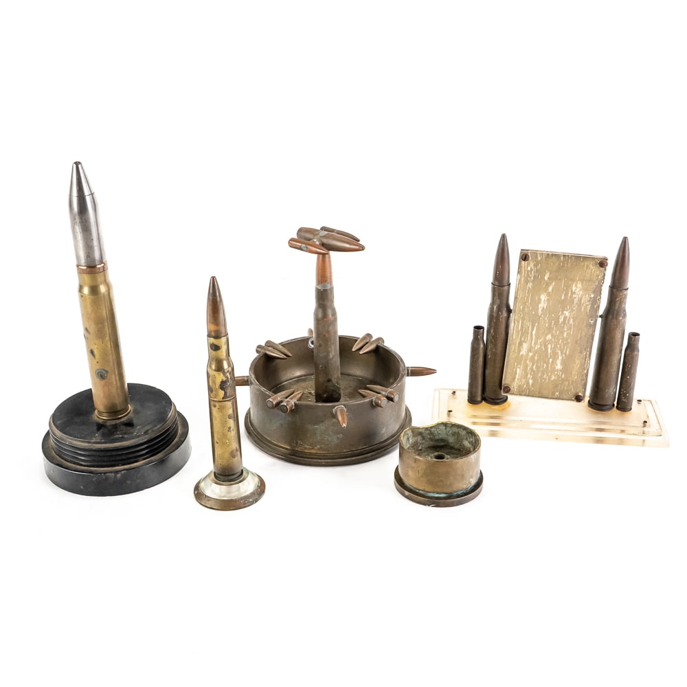 WWII Era Trench Art Lot: 5 Pieces of WWII era trench art. Trench art is made from Artillery shell casings, rifle, and machine gun bullets. 1 40mm cannon ashtray, 1 artillery shell ashtray with .30 and .50 cal projectiles, 1 2