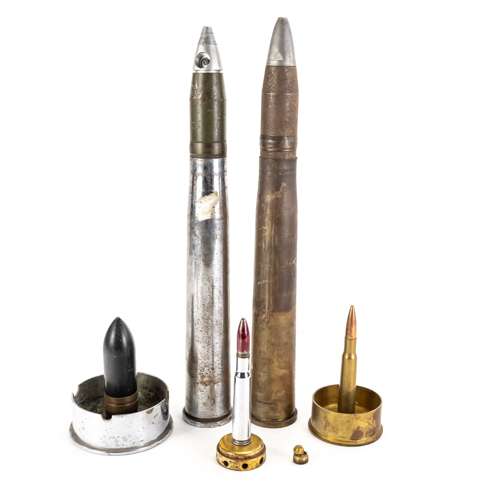 WWII Era Trench Art Lot: 5 Pieces of WWII era trench art. Trench art is made from Artillery shell casings, rifle, and machine gun bullets. 2 40mm cannon display rounds, 1 ashtray with 37mm projectile, 1 artillery shell