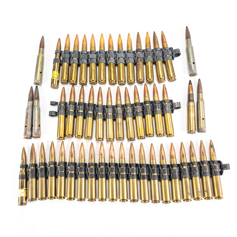 50rds of .50cal Browning Dummy Ammunition: 50 rounds of .50 caliber Browning machine gun dummy ammunition. 45 rounds of linked ammunition made from fired casings and reseated bullets along with 5 rounds of loose military dummy rounds.
