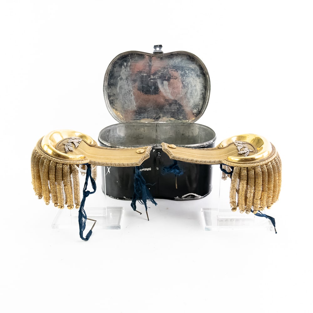 1832-1851 US Navy CPT Cased Epaulettes: Cased epaulette set for a United States Navy Captain. This particular style was in use between 1832-1851. The pair comes in its original functional case. Black exterior finish with silver metal