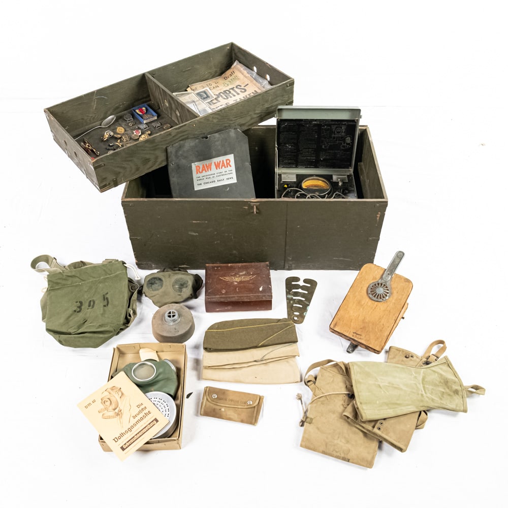 Footlocker-Korean War, WWII Contents Mixed: This comprehensive and eclectic collection features a 1952-dated military footlocker by Texas Trunk Co. Inc., housing an extensive array of 20th-century militaria. The collection is anchored by a