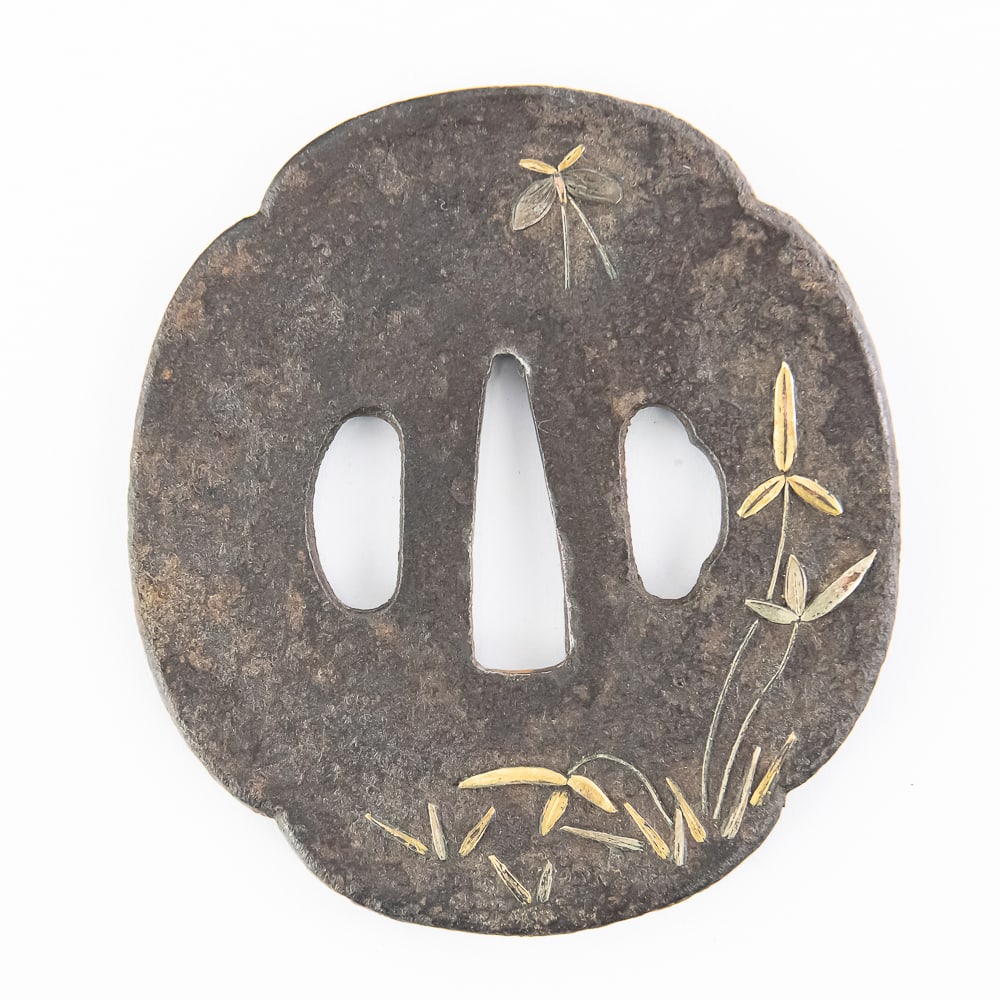 Antique Japanese Iron Mokko Tsuba: This is a classic Japanese sword guard, or tsuba, crafted in a soft-lobed mokko-gata (quince flower) shape, likely dating from the mid-to-late Edo period. The plate is forged from a dark, patinated
