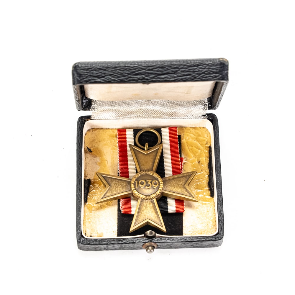 WWII German War Merit Cross 2nd Class-Cased: This lot features a WWII-era German War Merit Cross 2nd Class without Swords (Kriegsverdienstkreuz 2. Klasse ohne Schwerter). Struck in a bronze-toned alloy, this award features the Maltese cross