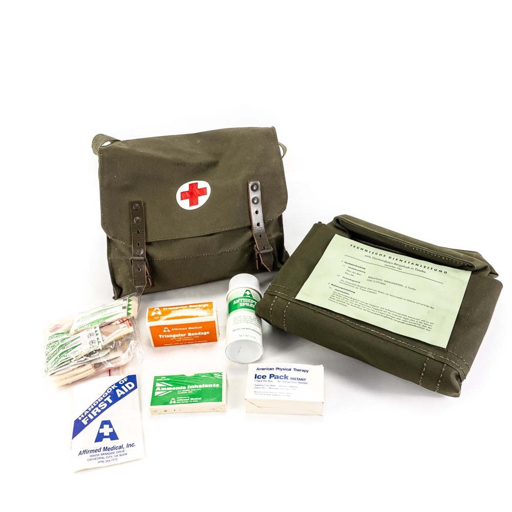 West German Bundeswehr Medical Bag: This authentic Cold War-era West German Bundeswehr medical satchel, or Verwundetentuch-Tasche, was manufactured by Gottschalk & Co. in Kassel, dated February 1966. Constructed from heavy-duty olive