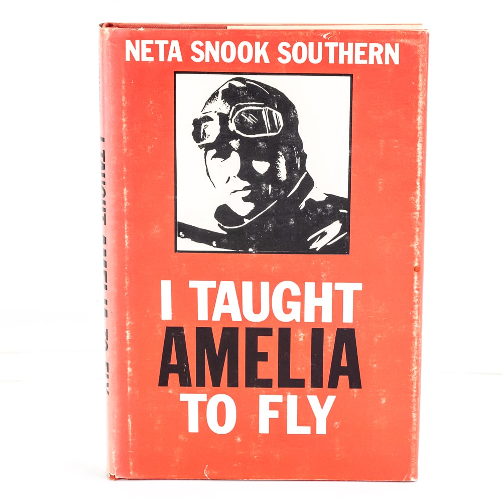 Autographed "I Taught Amelia to Fly" Book: The book is in good condition. HC w/ dust jacket. Autographed by Neta Snook Southern. Published by Vantage Press. First Edition 1974. See photos.