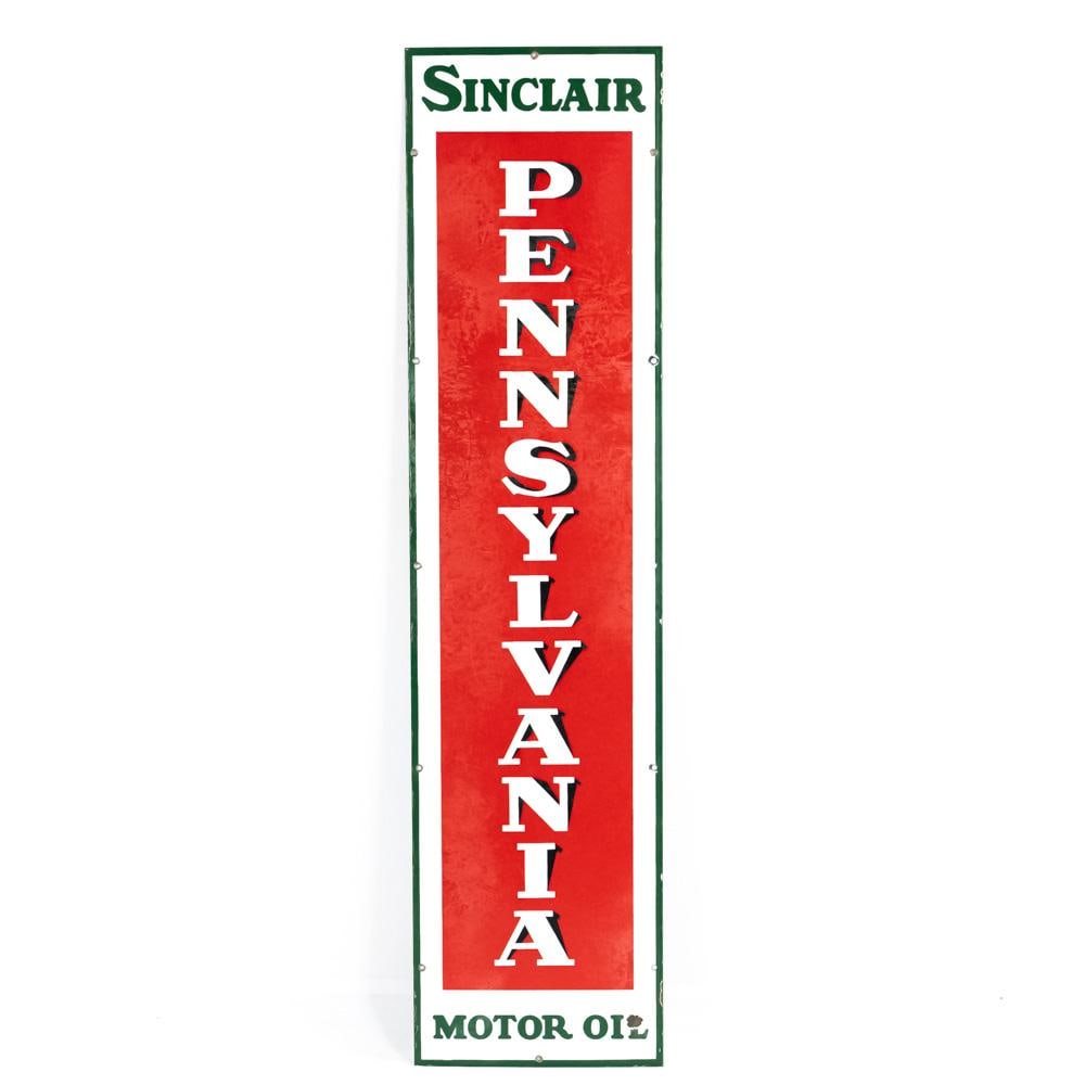 Sinclair Pennsylvania Oil SSP Advertising Sign: "Sinclair Pennsylvania Motor Oil" single sided elongated porcelain advertising sign. Very Good to good overall condition with some discoloration, stray marks, porcelain chips (by "L" and edges) and ox