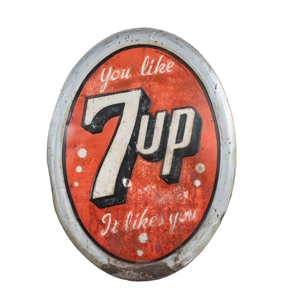 You Like 7-Up, It Likes You SST Advertising Sign: Vintage "You Like 7-Up, It Likes You" oval embossed tin single sided metal advertising sign. "Stout Sign Co. St. Louis Mo, 30" stamped near bottom edge. Good overall condition with moderate discolorat