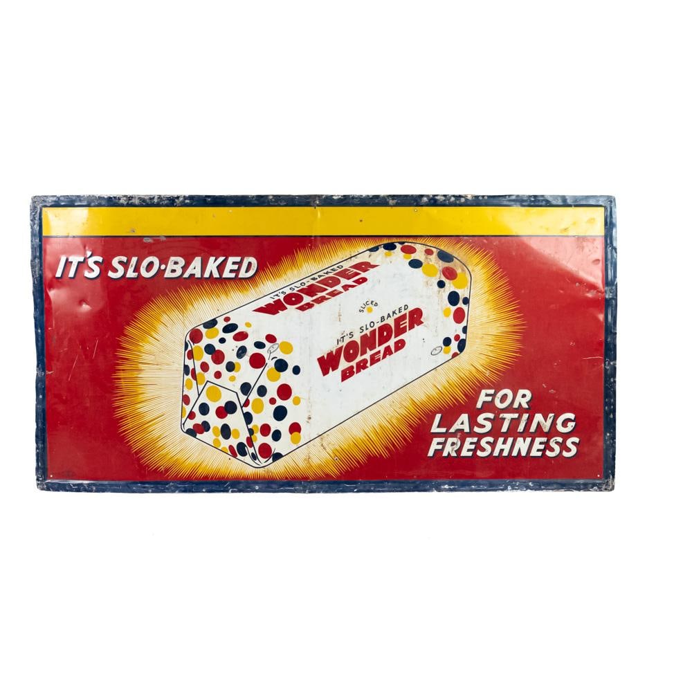 1950s 73" Wonder Bread SS Tin Advertising Sign: Hard to come by 1950s Wonder Bread single sided tin advertising sign; large and in charge approximately 37"t x 73"l. Presents well with attractive color. "Slo Backed for Lasting Freshness". Good overa