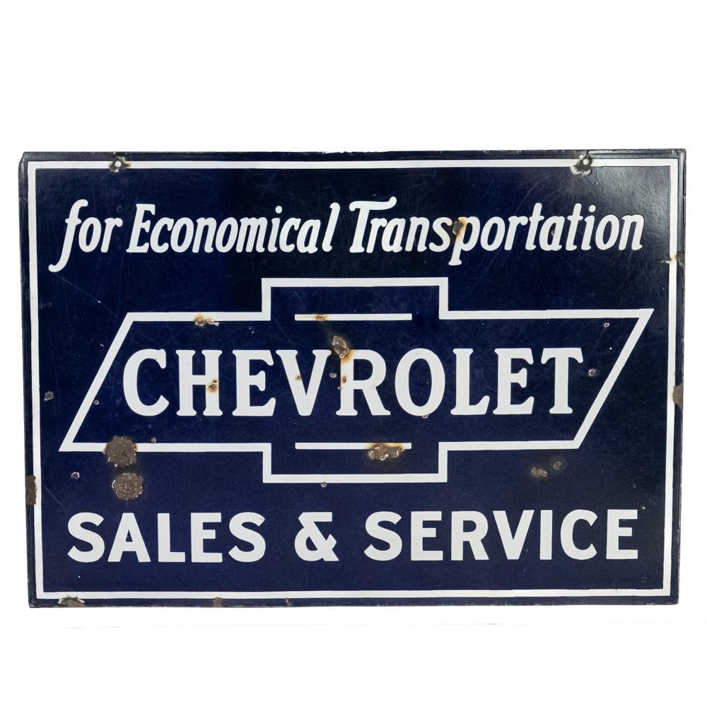 Chevrolet Sales & Service DSP Advertising Sign: "Chevrolet Sales & Service" double sided porcelain advertising sign featuring the iconic "Chevrolet Bow Tie". Good overall condition with some age and wear related cosmetic imperfections including som