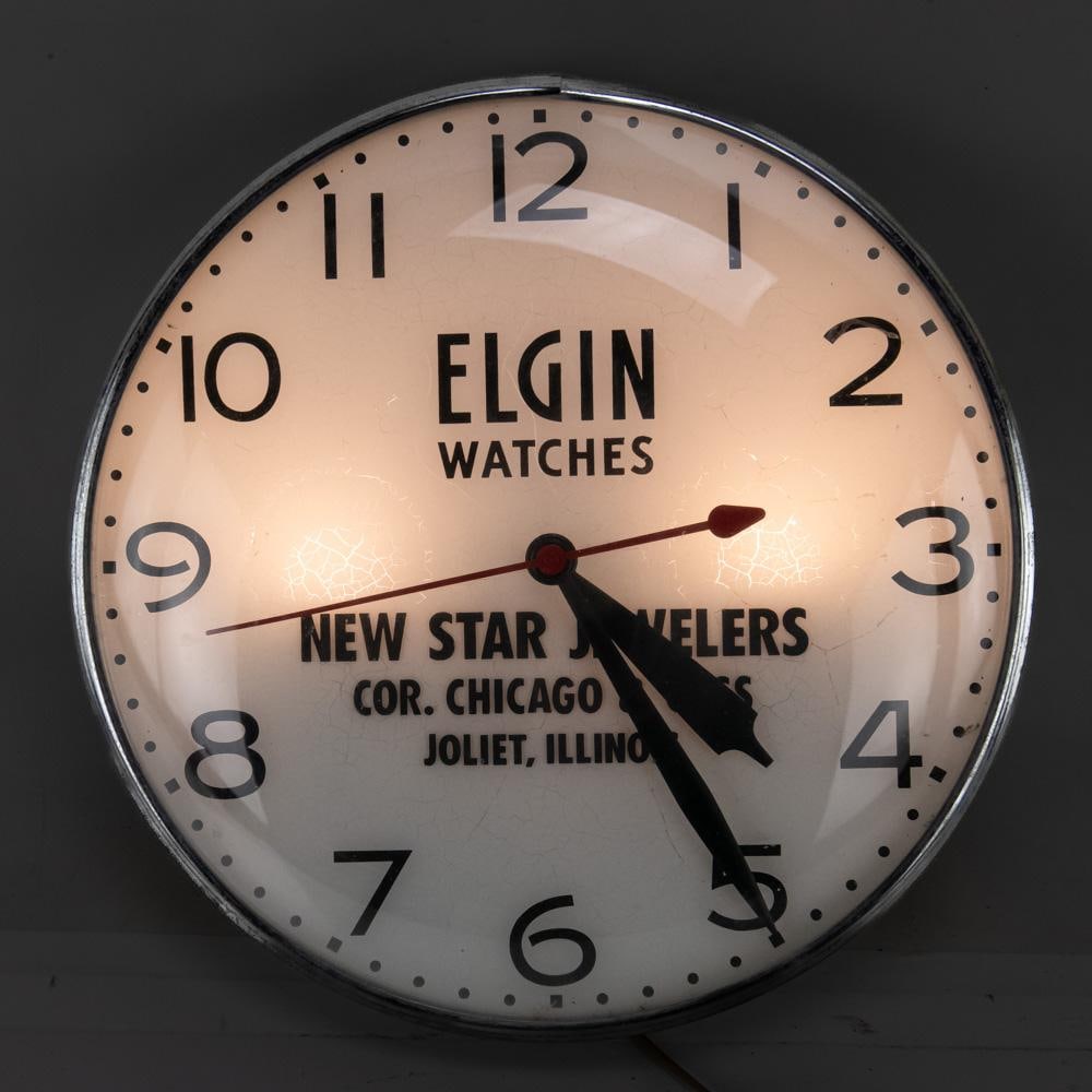 Elgin Watches Inspector Dealer Advertising Clock: Vintage Elgin Watches Inspector Jewelry Dealer illuminated advertising clock. "New Star Jewelers Chicago Joliet", good to very good overall working condition with light age and wear. Approximately 14.