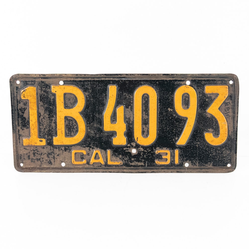 California 1931 License Plate: # 1B 40 93 in fair to good condition with light surface rust and an extra hole drilled under the 40. See pics. From the Jim Dvorak collection.