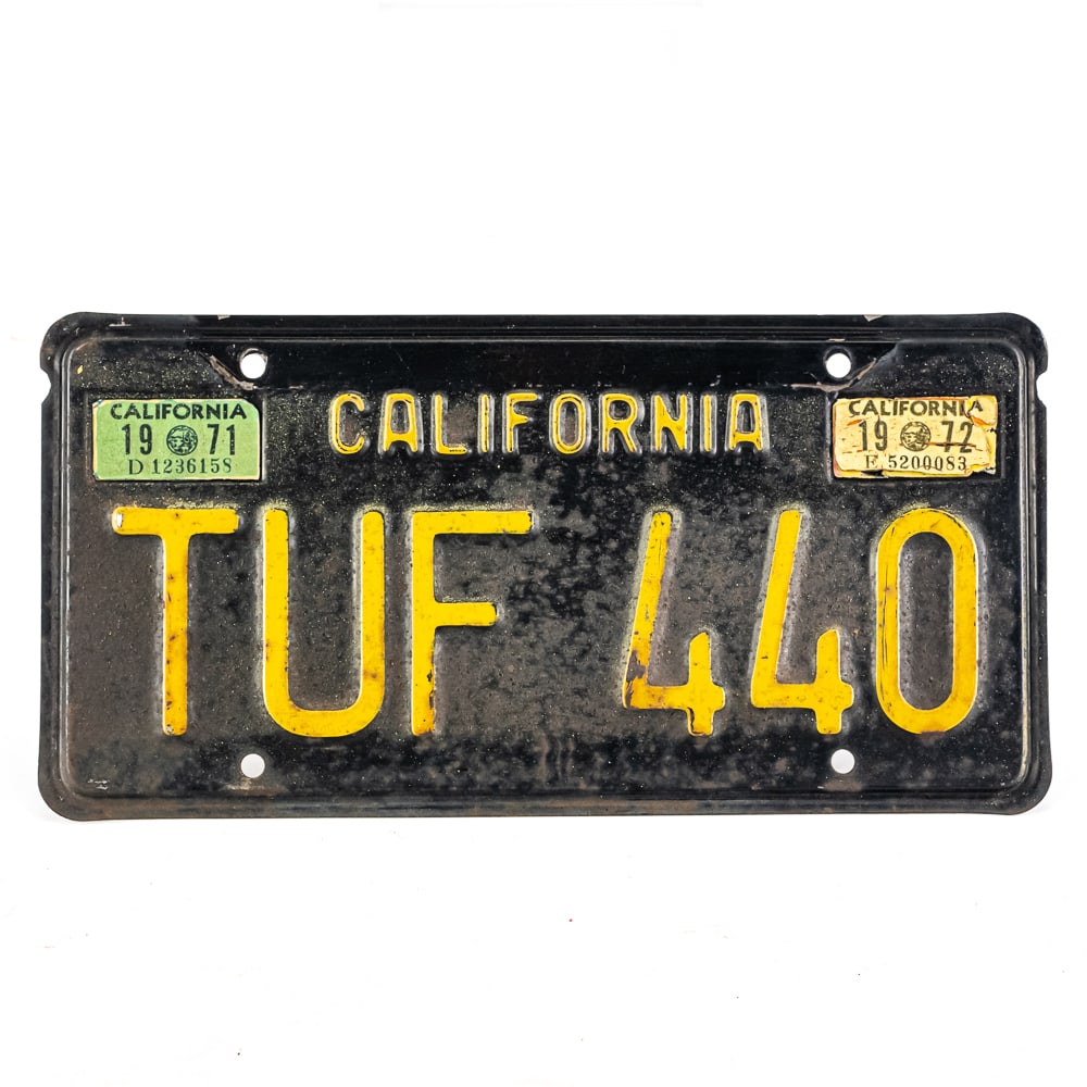 California 1971-2 License Plate: # TUF 440 in fair original condition with corrosion to the front of the plate. See pics. From the Jim Dvorak collection.