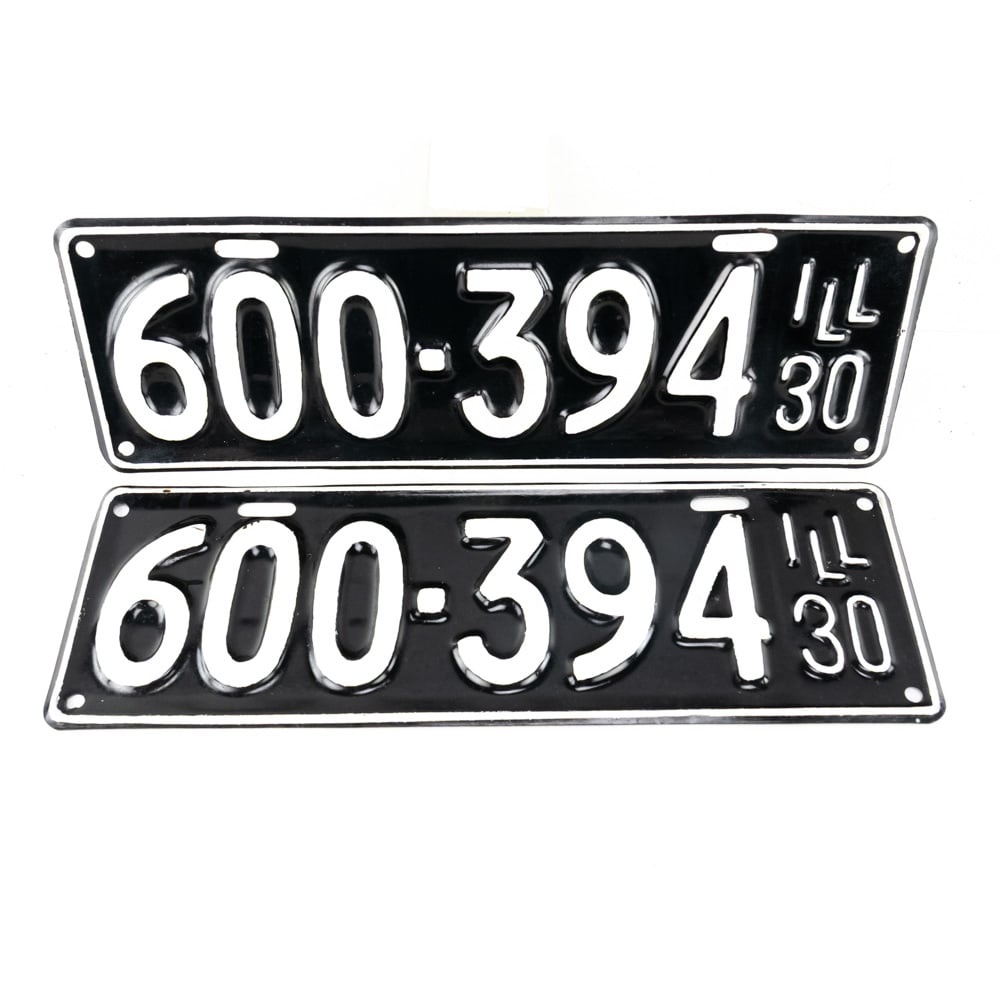 Illinois 1930 License Plate Pair: # 600-394 repaint pair in good condition with the numerals showing brush strikes. See pics. From the Jim Dvorak collection.