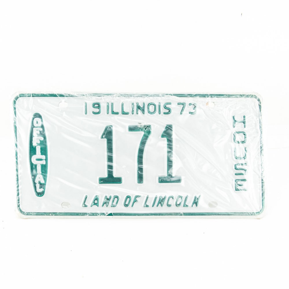 Illinois 1973 Official House License Plate Pair: # 171 Official House plate pair in VG original condition in the original wrapper. Please note the the top plate has a nick in the paint at the top of the 7.