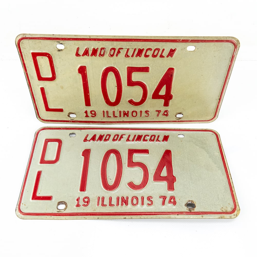 Illinois 1974 Dealer License Plate Pair: # 1054 Dealer pair in VG original condition. See pics. From the Jim Dvorak collection.