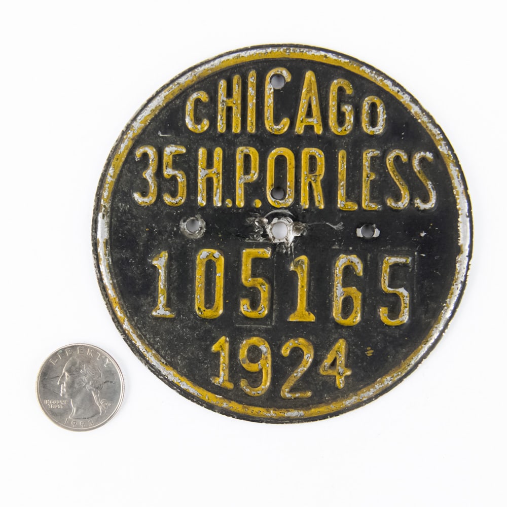 Chicago Illinois 1924 Vehicle Tax Tag: # 105165 aluminum tag in good condition with some paint loss and an extra hole drilled above the center hole. See pics. From the Jim Dvorak collection.
