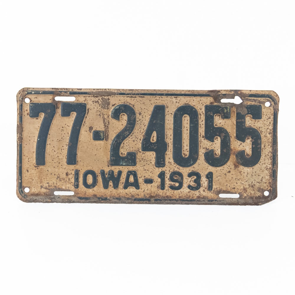 Iowa 1931 License Plate: # 77-24055 in fair original condition with surface rust and enlarged top right mounting hole. See pics. From the Jim Dvorak collection.