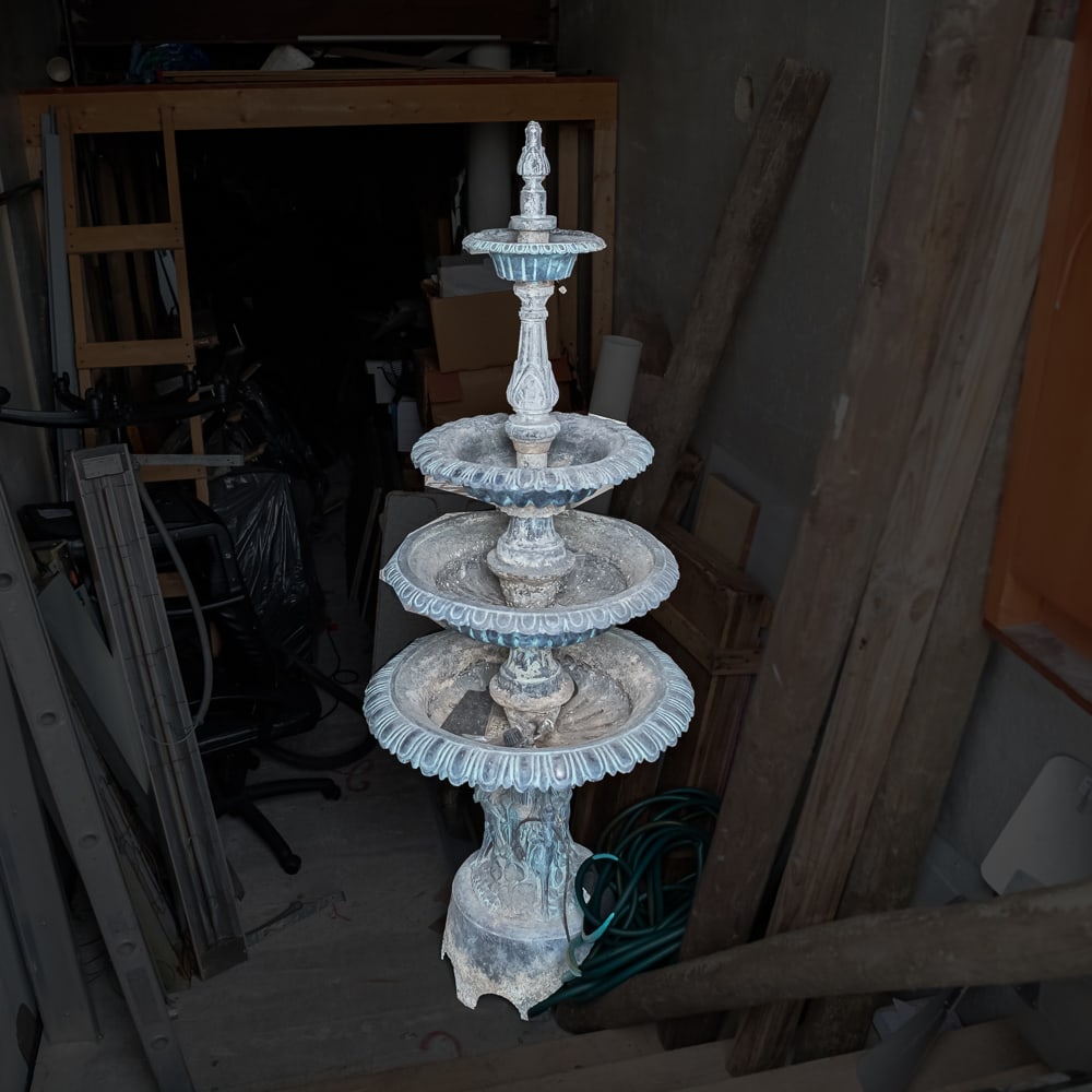 Four Tiered Cast Iron Water Fountain (Roof): Originally acquired from Old Chicago Amusement Park in Bolingbrook, IL comes an imposing and grand example of classical estate statuary, standing at a significant height that commands attention in any