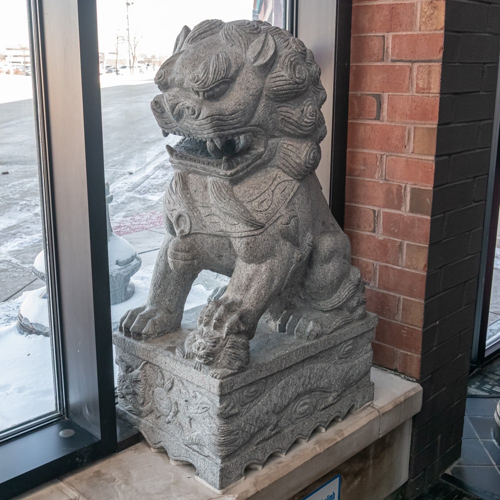 Large Foo Dog: Large Chinese Foo Dog carved from stone located in theater lobby. In overall good condition. Measures 48" tall, 20" wide, 28" deep. VERY HEAVY. Please use photos to judge condition and bid accordingly