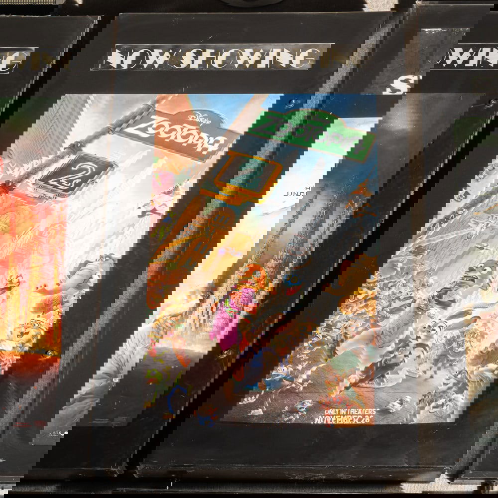 Now Showing Movie Poster Case: Back lit Now Showing one sheet movie poster case in good condition. Has lock and key. Overall measures 31" wide, 53.25" tall, 7" deep. Please use photos to judge condition and bid accordingly.