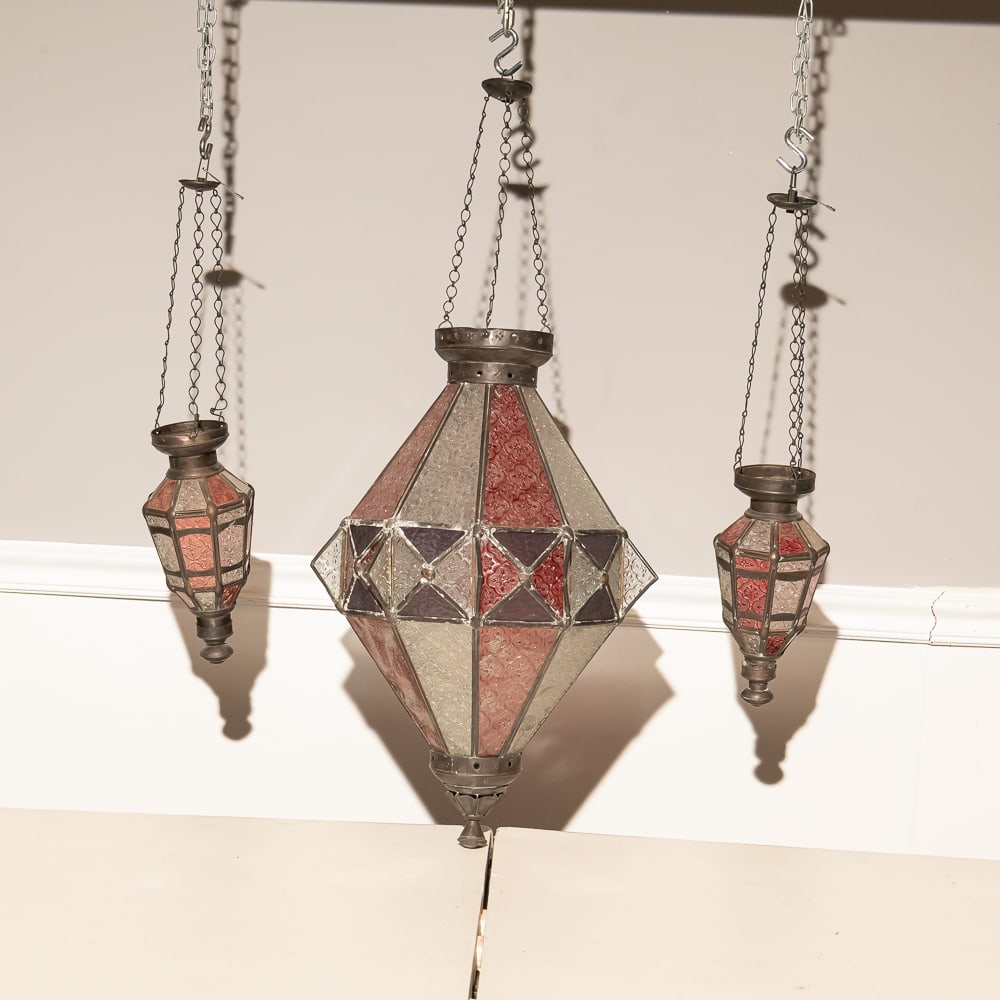 Stained Glass Hanging Lantern Trio (3): This striking set features three hanging lanterns in a classic Moravian or "Star" influenced geometric style, likely dating to the mid-20th century. The pieces are constructed with textured slag