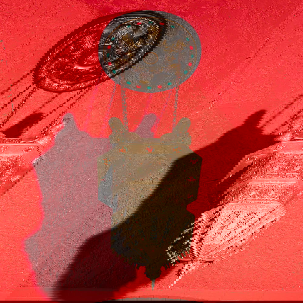 Large Ornate Moorish Chandelier by Chaplin: This exquisite hanging lantern is a masterclass in Islamic-style metalwork, likely originating from Morocco or Egypt. It features intricate silver-toned wire filigree and pierced metal panels that