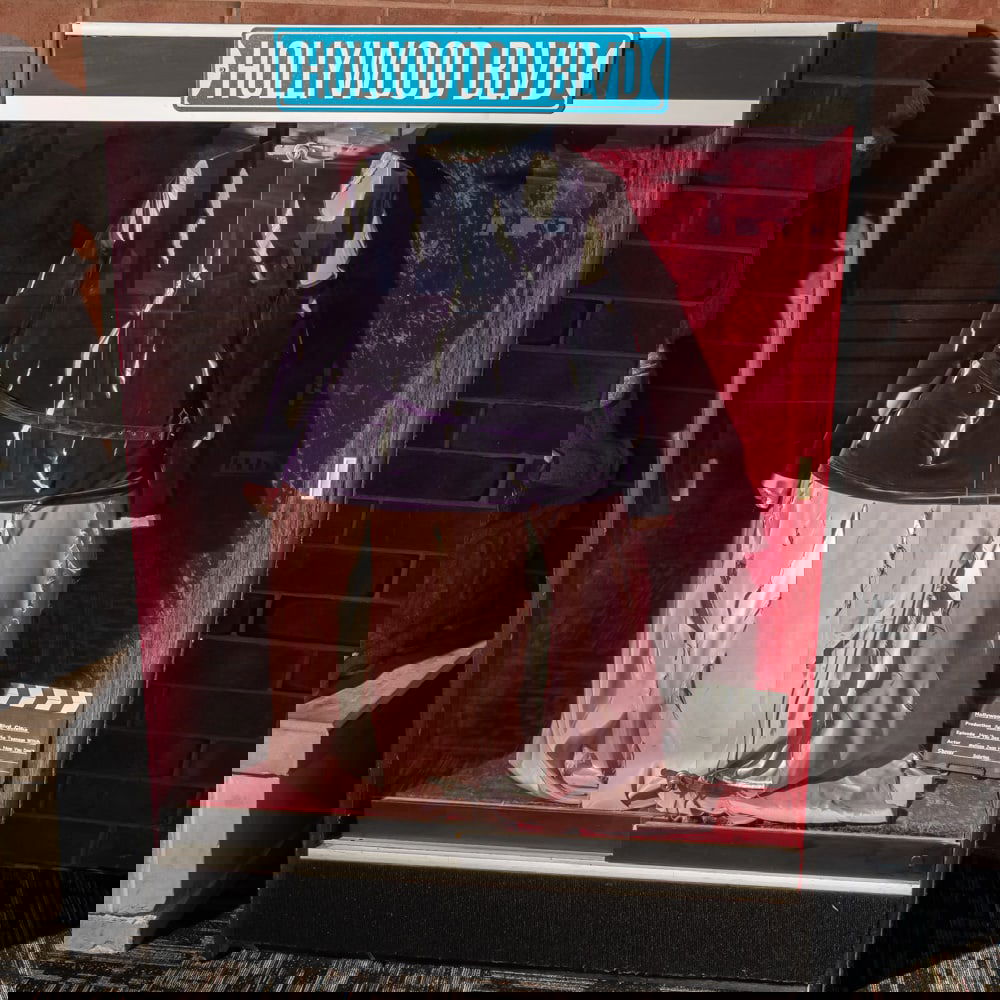 Large Wood Display Case With Glass Doors: Large wood display case with 2 sliding glass front entrance doors, lock and key. Measures 68" tall, 48" wide, 20" deep. No contents included. Please use photos to judge condition and bid