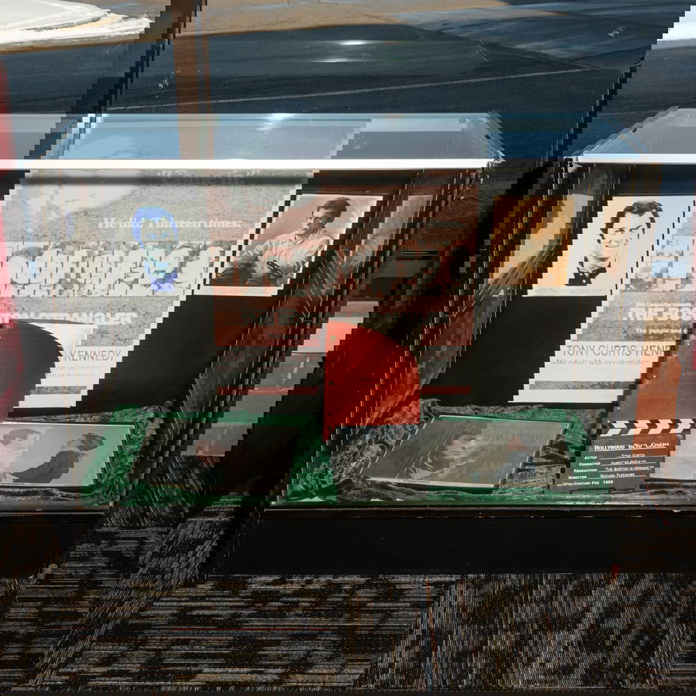 Glass Display Case (Boston Strangler Not Incl ): Glass display case. Measures 48” x20” x38” Please note: Please use photos to judge condition and bid accordingly. Please note: Buyer is responsible for removal. From the Hollywood Bl