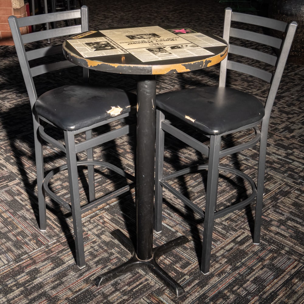 Rocky Horror Themed Pub Table w/2 Chairs: This is a fantastic bit of local cinema history, featuring a classic pedestal-style pub table decoupaged with newspaper clippings and "Hollywood" motifs centered around the Rocky Horror Picture Show a