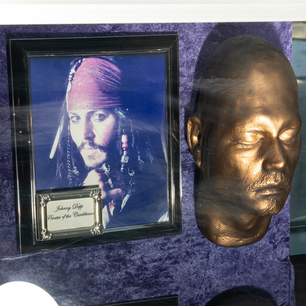 Johnny Depp Life Mask For Pirates: Original life mask of Johnny Depp for 2003 Pirates of the Caribbean movie. In good condition. Comes with framed color 8 X 10 of Depp as Jack Sparrow.Life masks are created for special effects makeup a