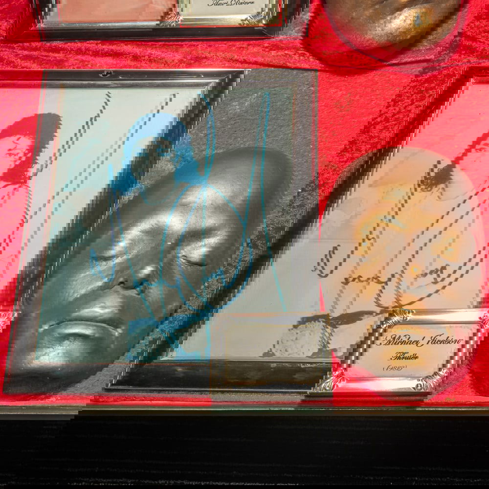 Michael Jackson Mask Life Mask for Thriller: "Darkness falls across the land, the midnight hour is cloe at hand..."Life mask of Michael Jackson for the 1982 Thriller video. In good condition. Comes with an 8 X 10 framed autographed photo of