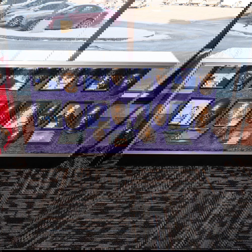 Glass Showcase: Glass showcase with sliding doors on the back in good condition. Measures 70" wide x 22" deep x 38" tall.Please use photos to judge condition and bid accordingly. Please note: Buyer is responsible