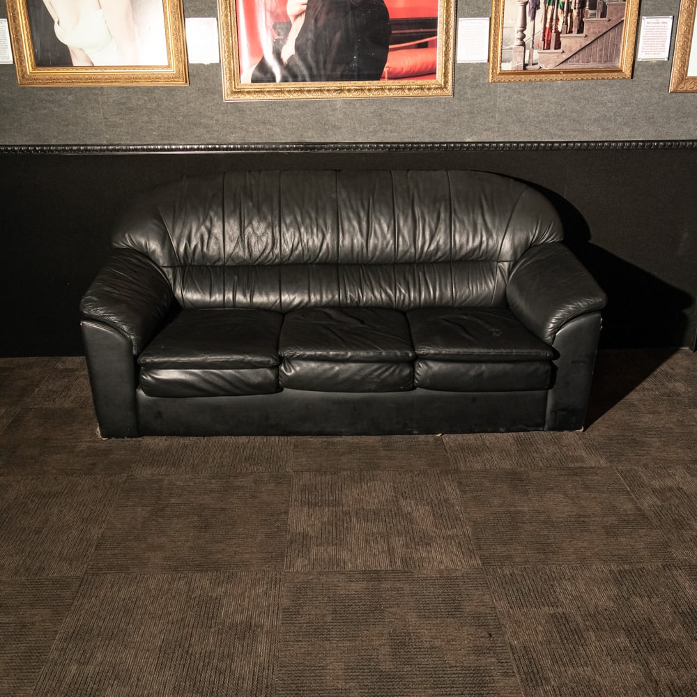 2 Matching Couches and Chair: 3 piece matching set includes 2 couches and one chair. Covered in imitation leather. In good used condition. Couches measure 82" wide x 40" deep x 38" tall. Chair measures 38" deep x 38" tall x41" wid