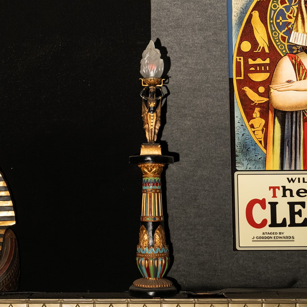 Egyptian Torch Lamp: A Golden Age Redux: Egyptian Torch Lamp: A Golden Age Redux. This striking figural lamp features a meticulously detailed Pharaoh sculpture in hand-painted resin, elevating an illuminated glass flame shade to create a dra
