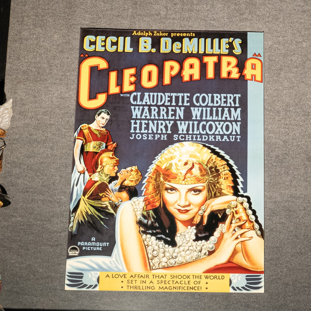 1934 Cleopatra Contemporary Movie Poster: Contemporary portrayal of an 1934 Cleopatra movie poster starring Claudette Colbert. Presents extremely well and is in very good to good overall condition, approximately 61.5" x 43" with foam core bac