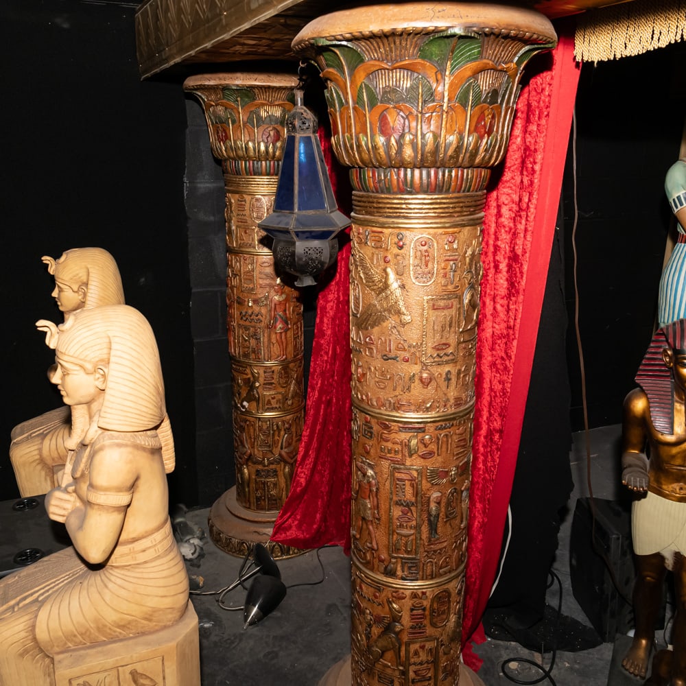 4 Egyptian Columns, Lintel & Lanterns: This impressive architectural assembly is a masterclass in theatrical "Egyptomania," now featuring two Moorish-style pendant lanterns that add a layer of atmospheric lighting to the portal. The