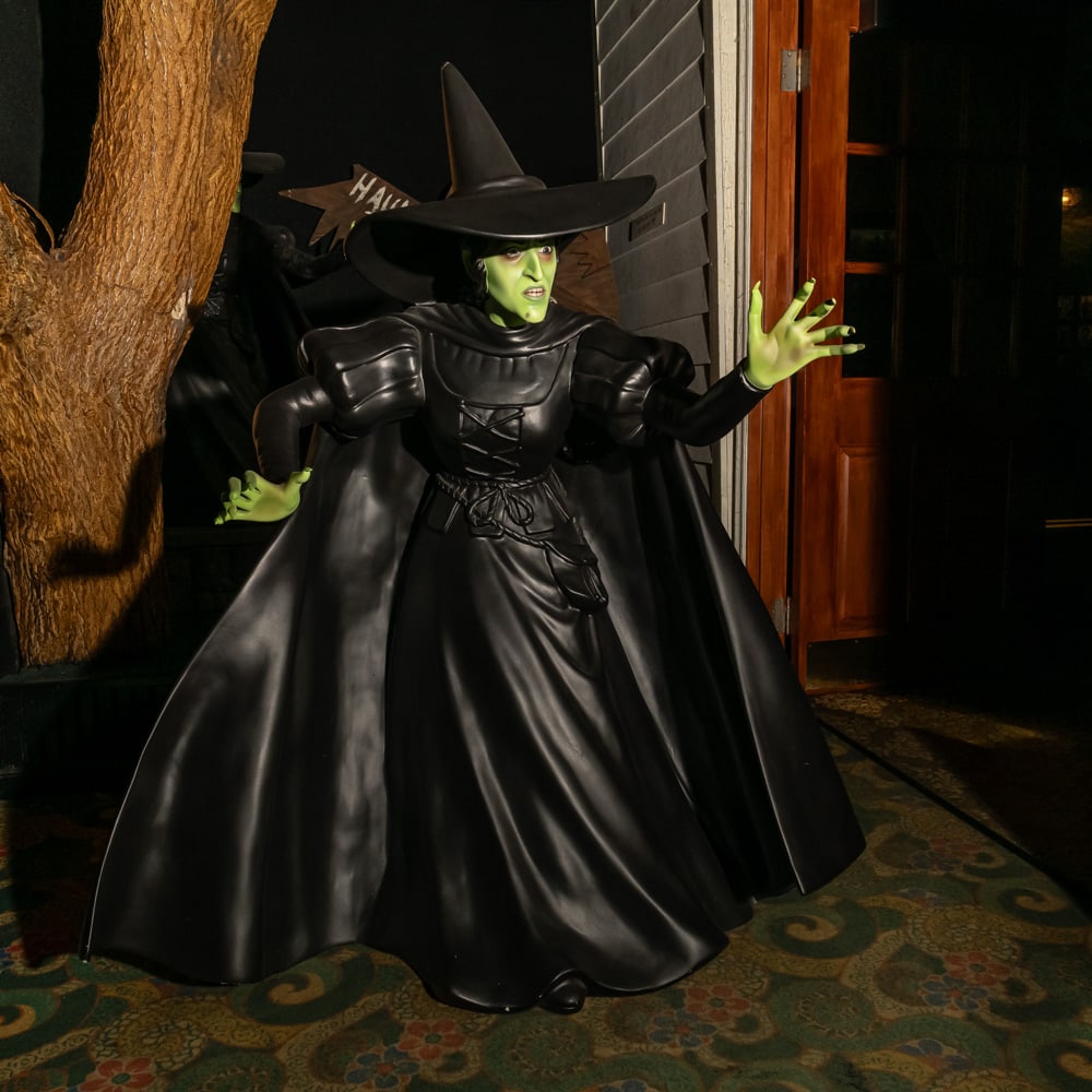 Life-Size Wicked Witch of the West Prop: This impressive, life-size figure captures the iconic menace of the Wicked Witch of the West, likely a Don Post or Rubie's style professional display piece inspired by the 1939 classic. Constructed
