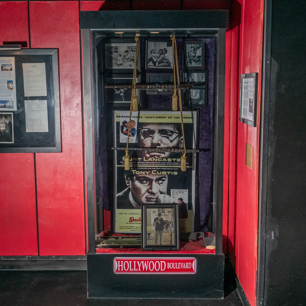 Glass Showcase: Glass showcase with glass on all 4 sides and sliding glass doors. In good condition. Does not include contents sold as previous lot. Measures 39" wide X 17.5" deep X 82.5" tall Please use photos to ju