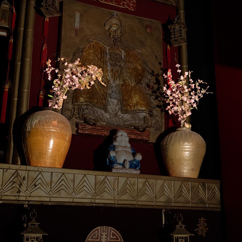 Pair of Glazed Ceramic Jars with Flora: This striking pair of large, ovoid-form ceramic jars showcases a rustic, high-gloss ochre glaze with a wonderfully textured, earthen finish near the rims, reminiscent of traditional provincial stonewa
