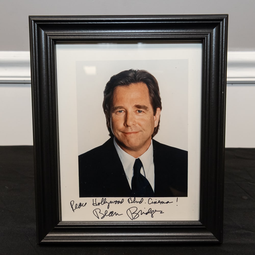 Framed Beau Bridges Signed Photo 8x10: A classic piece of Hollywood memorabilia, this 8" x 10" color publicity headshot features a crisp, authentic signature from the multi-Emmy and Golden Globe-winning actor Beau Bridges. The inscription